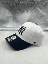 Load image into Gallery viewer, New York Yankees MLB &#39;47 Brand Natural White Two Tone Clean Up Adjustable Hat displayed from the front, showcasing its stylish design and adjustable strap.
