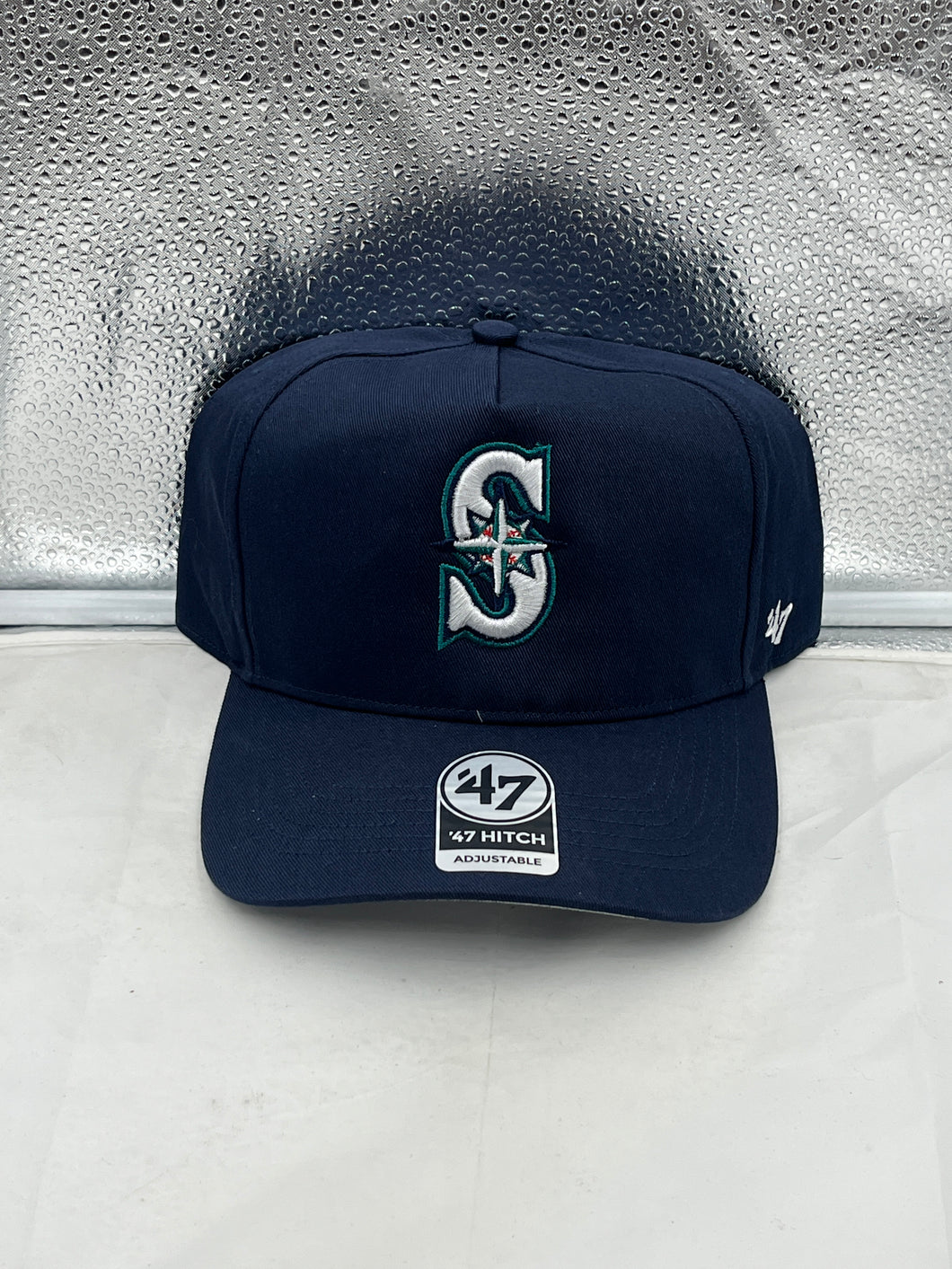 Seattle Mariners MLB '47 Brand Navy Blue Hitch Adjustable Snapback Hat showcasing the iconic Mariners logo and stylish design.