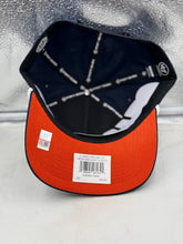 Load image into Gallery viewer, Flat lay of the Auburn Tigers NCAA '47 Brand hat surrounded by Auburn team merchandise, showcasing team pride.
