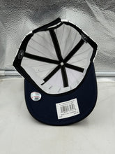 Load image into Gallery viewer, Model wearing the New York Yankees MLB &#39;47 Brand White Pinstripe Two Tone MVP Adjustable Hat, showcasing its trendy design for all New York Yankees hat lovers.
