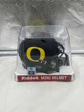 Load image into Gallery viewer, Oregon Ducks NCAA Riddell Speed Black Mini Helmet showcasing sleek design and vibrant team colors, perfect collectible for fans.
