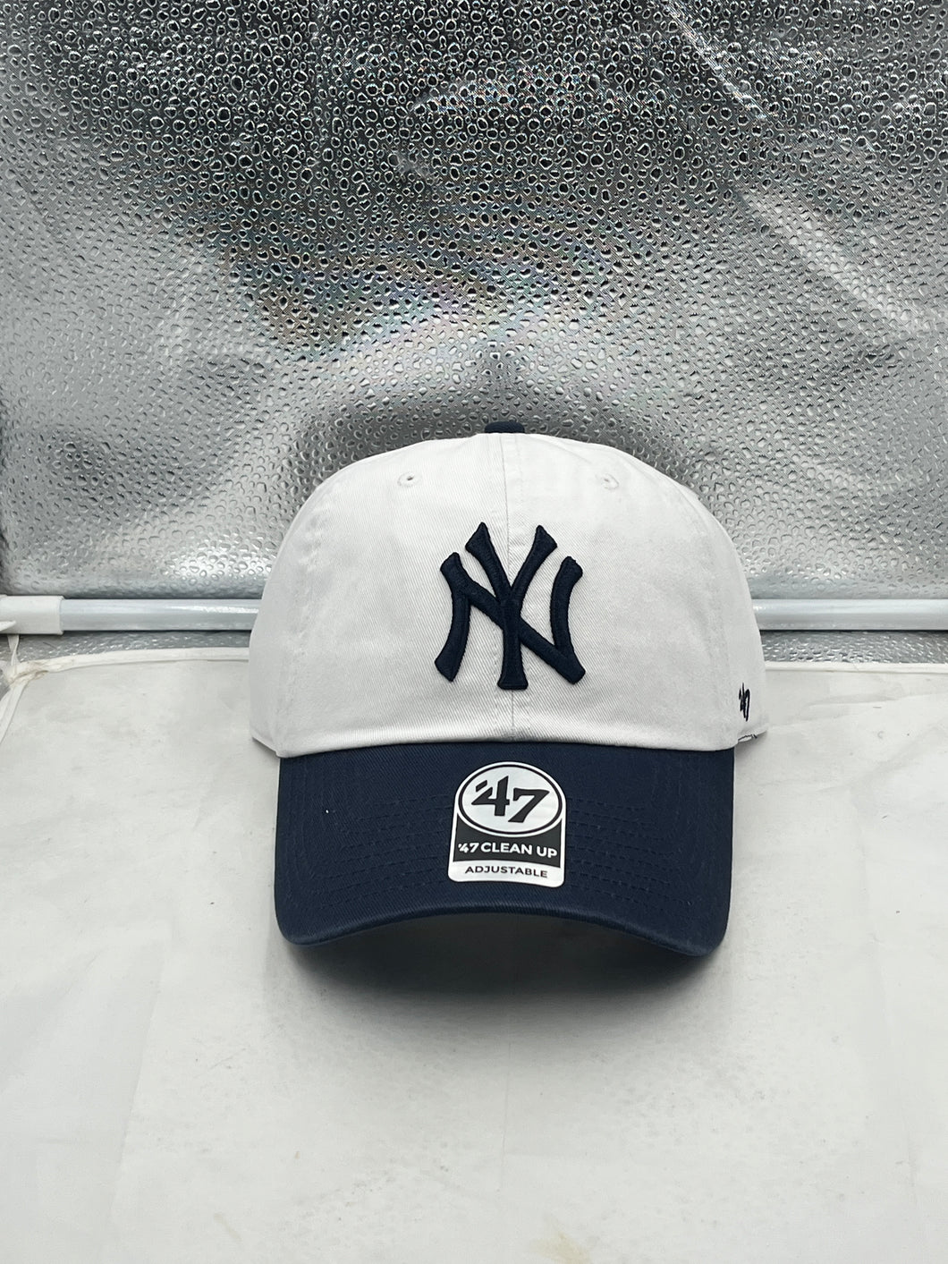 New York Yankees MLB '47 Brand Natural White Two Tone Clean Up Adjustable Hat showcasing a stylish two-tone design in natural white and team colors, perfect for game day and casual outings.