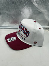 Load image into Gallery viewer, Close-up view of the Colorado Avalanche NHL '47 White Two Tone Roscoe Hitch Adjustable Snapback Hat highlighting the high-quality materials and color scheme.
