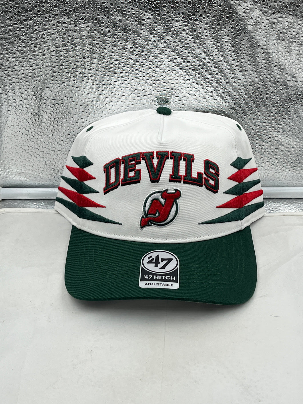New Jersey Devils NHL '47 Brand White Diamond Hitch Adjustable Snapback Hat showcasing its sleek design and adjustable fit, perfect for fans of the team.