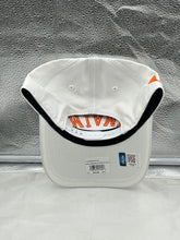 Load image into Gallery viewer, Person wearing the Miami Hurricanes NCAA &#39;47 White Reversed Hitch Script Adjustable Snapback Hat at a game, demonstrating team spirit and style.
