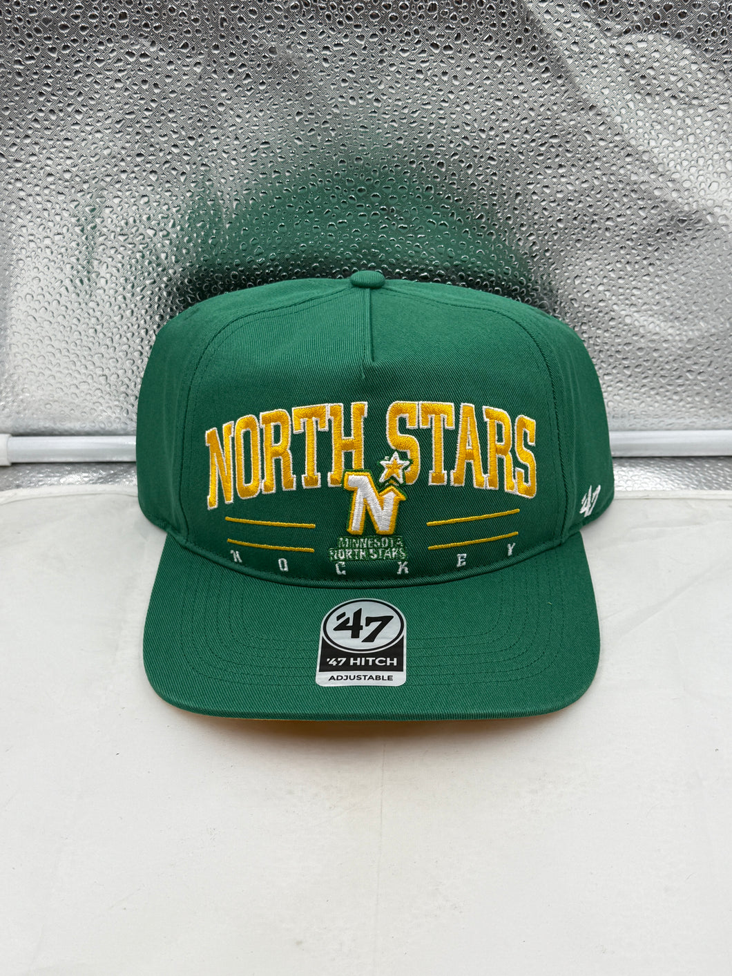 Minnesota North Stars NHL '47 Throwback Green Hitch Adjustable Snapback Hat, perfect for showing team pride with a vintage twist.