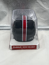 Load image into Gallery viewer, South Carolina Gamecocks NCAA Riddell Speed Black Mini Helmet displayed on a shelf, showcasing its sleek black design and iconic Gamecocks logo, perfect for fans and collectors.
