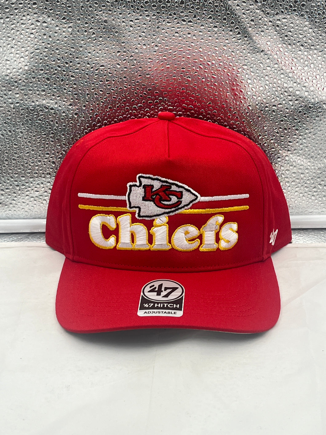 Kansas City Chiefs NFL '47 Red Script Hitch Snapback Adjustable Hat displayed on a mannequin, highlighting its vibrant red color and iconic logo.