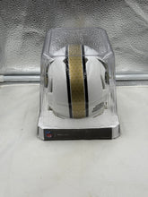 Load image into Gallery viewer, Side view of the New Orleans Saints NFL Riddell Speed On-Field Alternate White Mini Helmet, capturing its sleek design and vibrant team colors, a must-have for New Orleans Saints Mini Helmet enthusiasts.
