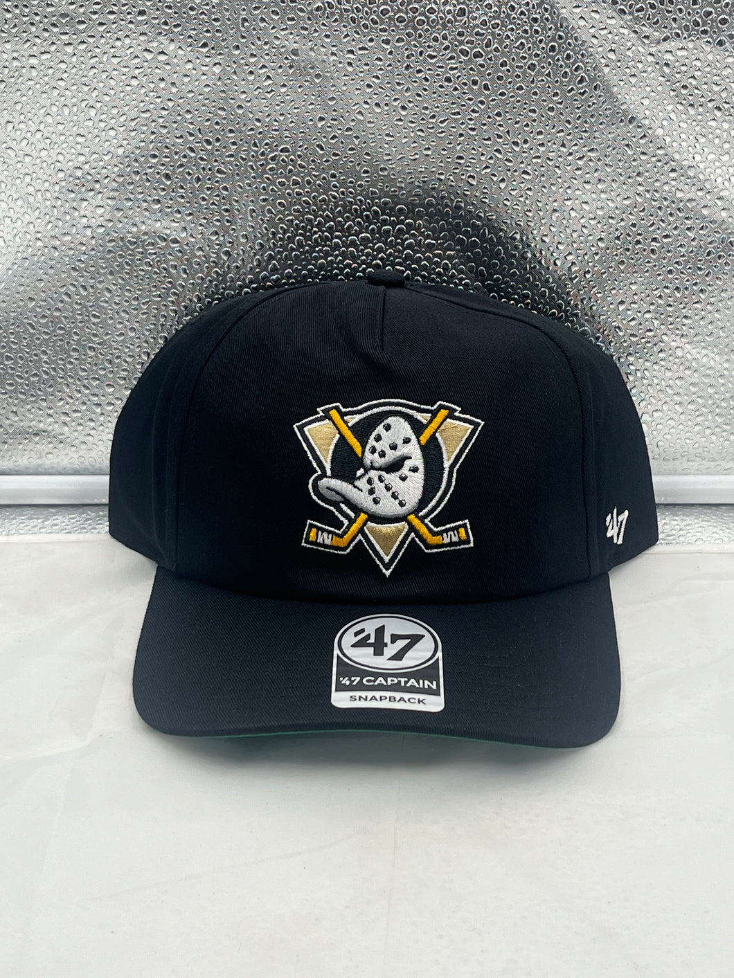 Anaheim Ducks NHL '47 Brand Throwback Black Hitch Adjustable Snapback Hat showcasing classic design, quality materials, and iconic team logo, perfect for hockey fans.