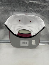Load image into Gallery viewer, Side view of the Colorado Avalanche NHL '47 White Two Tone Roscoe Hitch Adjustable Snapback Hat on a person, emphasizing its comfortable fit for all head sizes.
