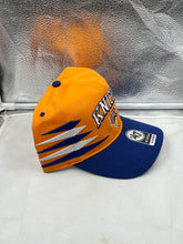 Load image into Gallery viewer, Side view of New York Knicks NBA &#39;47 Brand Orange Diamond Hitch Adjustable Snapback Hat highlighting its stylish design.
