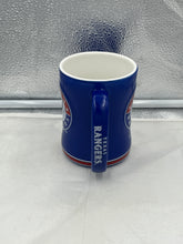 Load image into Gallery viewer, Close-up of the Texas Rangers MLB Boelter 14oz Mug Cup emphasizing durable design and ergonomic handle for comfortable sipping.
