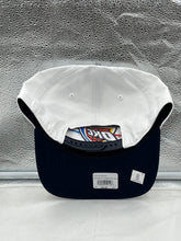 Load image into Gallery viewer, Oklahoma City Thunder NBA &#39;47 Brand White Two Tone Hitch Adjustable Snapback Hat worn by a fan at a game, emphasizing team pride and comfort.
