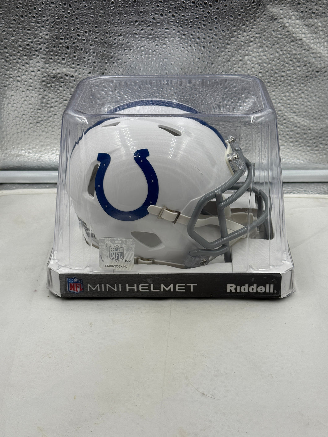 Detailed view of the Indianapolis Colts NFL Riddell Speed White Mini Helmet showcasing the team's iconic logo.