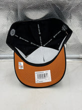 Load image into Gallery viewer, Lifestyle shot of the Texas Longhorns NCAA '47 Brand Script Black Rope Hitch Adjustable Snapback Hat worn in a casual setting, perfect for game day or everyday outings.
