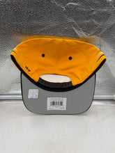 Load image into Gallery viewer, Pittsburgh Steelers hat worn by a fan at a game, showcasing the vibrant yellow diamond design that stands out in the crowd, symbolizing loyalty to the Steelers.
