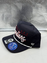 Load image into Gallery viewer, Side view of the Cleveland Guardians MLB &#39;47 Brand Navy Script Hitch Rope Adjustable Snapback Hat, highlighting the detailed stitching and vintage design, a must-have Cleveland Guardians hat for supporters.
