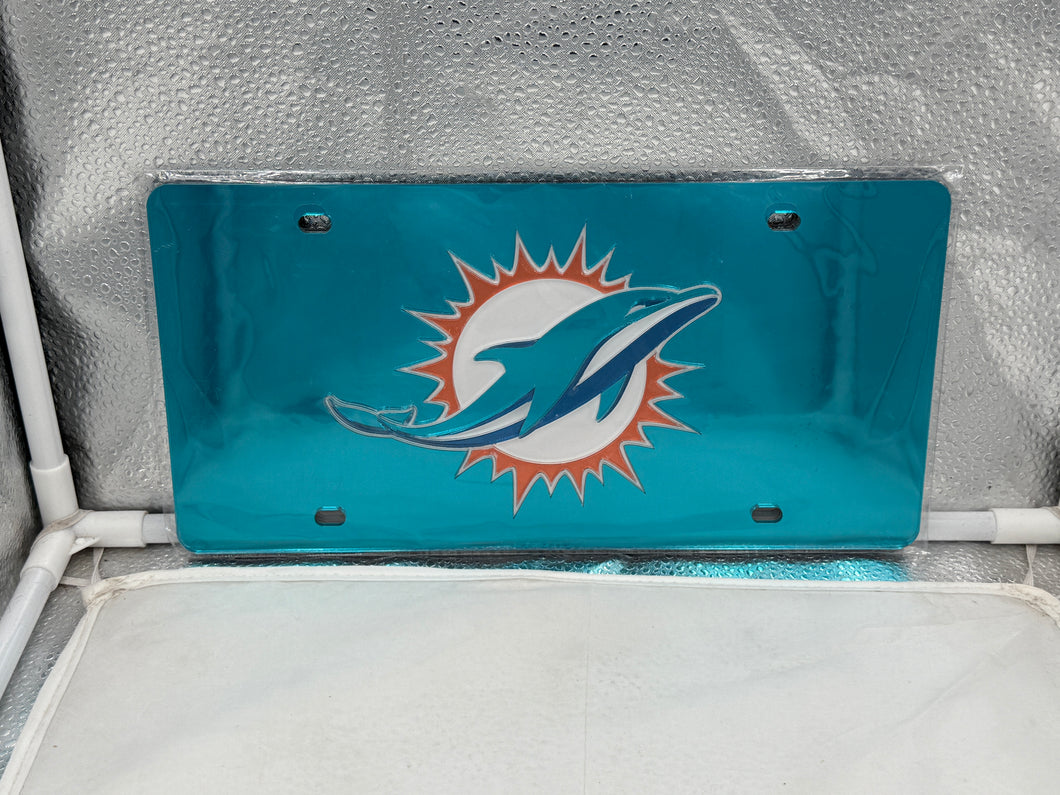 Miami Dolphins NFL Teal Reflective Lasercut License Plate by WinCraft, featuring a vibrant teal design with lasercut detailing, ideal for showcasing team pride on your vehicle.