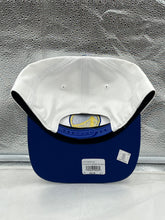 Load image into Gallery viewer, Golden State Warriors NBA &#39;47 Brand White Two Tone Hitch Adjustable Snapback Hat displayed outdoors with fans, highlighting team spirit and style.
