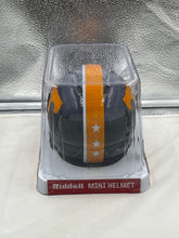 Load image into Gallery viewer, A Tennessee Volunteers NCAA Riddell Smoky Mountain Alternate Replica Mini Helmet in a festive tailgating setup, ideal for game day celebrations.
