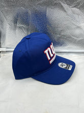 Load image into Gallery viewer, Close-up of the front logo on the New York Giants NFL &#39;47 Brand Blue Hitch Snapback Adjustable Hat showcasing team spirit and high-quality materials.
