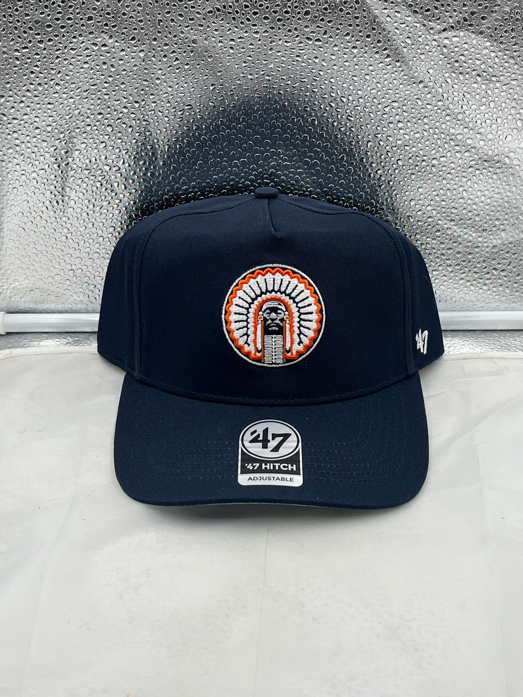 Illinois Fighting Illini NCAA '47 Throwback Navy Hitch Adjustable Snapback Hat displayed on a white background, showcasing its classic navy color, adjustable snapback design, and iconic team logo, perfect for fans.