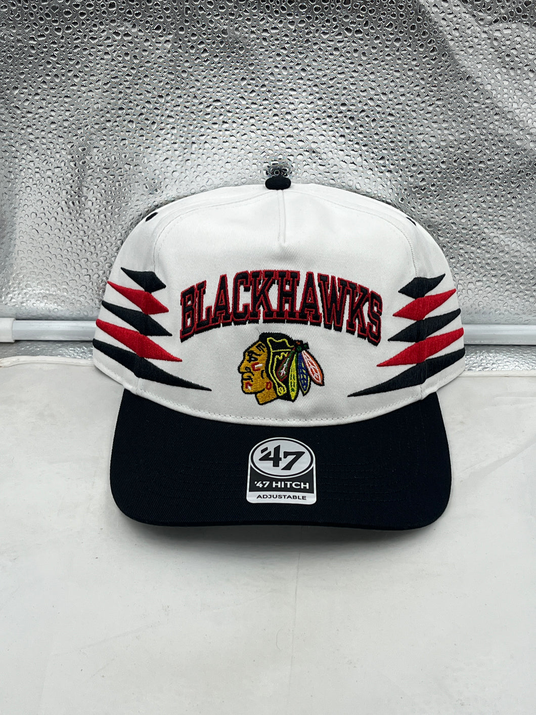 Chicago Blackhawks NHL '47 Brand White Diamond Hitch Adjustable Snapback Hat, stylish sports cap for fans, featuring a white diamond design and adjustable snapback closure.