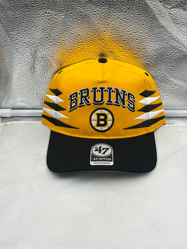 Boston Bruins NHL '47 Brand Yellow Diamond Hitch Adjustable Snapback Hat showcasing a stylish yellow design with a diamond pattern, perfect for fans and casual wear.