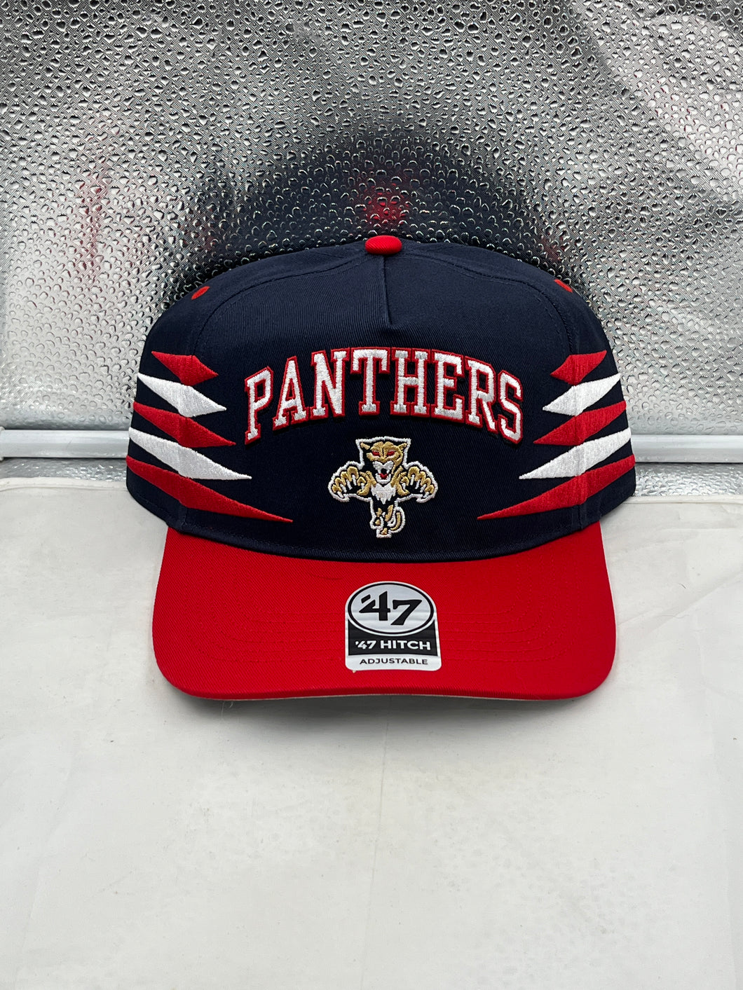 Florida Panthers NHL '47 Brand Navy Diamond Hitch Adjustable Snapback Hat showcasing the team's logo and design details in navy blue.