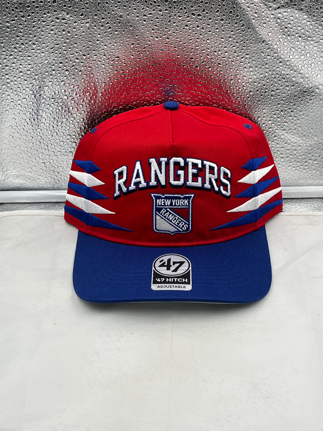 New York Rangers NHL '47 Brand Red Diamond Hitch Adjustable Snapback Hat featuring a vibrant red design, perfect for fans of the team.