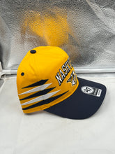 Load image into Gallery viewer, Nashville Predators NHL &#39;47 Brand Yellow Diamond Hitch Adjustable Snapback Hat on a table, highlighting its stylish design and high-quality materials.
