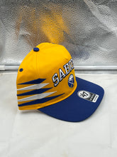 Load image into Gallery viewer, Buffalo Sabres NHL &#39;47 Brand Yellow Diamond Hitch Adjustable Snapback Hat back view, highlighting the snapback closure and unique diamond pattern.
