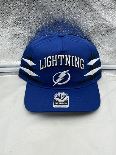Tampa Bay Lightning NHL '47 Brand Blue Diamond Hitch Adjustable Snapback Hat displayed prominently, showcasing the unique design and vibrant blue color ideal for fans.