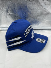 Load image into Gallery viewer, Tampa Bay Lightning NHL &#39;47 Brand Blue Diamond Hitch Adjustable Snapback Hat on a model during a sports event.
