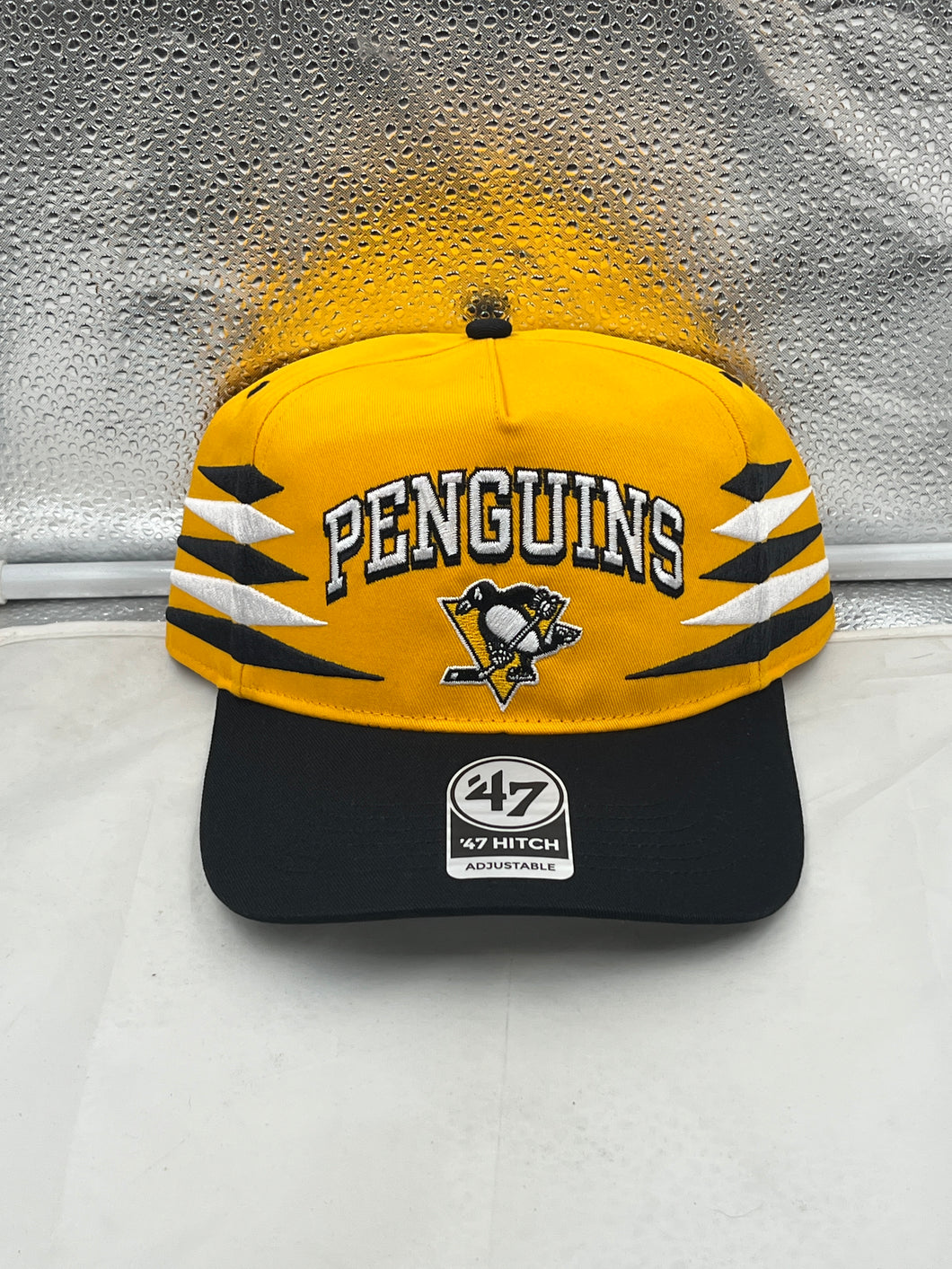 Pittsburgh Penguins NHL '47 Brand Yellow Diamond Hitch Adjustable Snapback Hat displayed on a white background, featuring the iconic team logo and vibrant yellow color, perfect for Penguins fans.