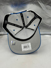 Load image into Gallery viewer, Model wearing the Detroit Lions NFL &#39;47 Brand White TT Diamond Hitch Snapback Adjustable Hat at a casual outing, demonstrating its versatile fashion appeal.
