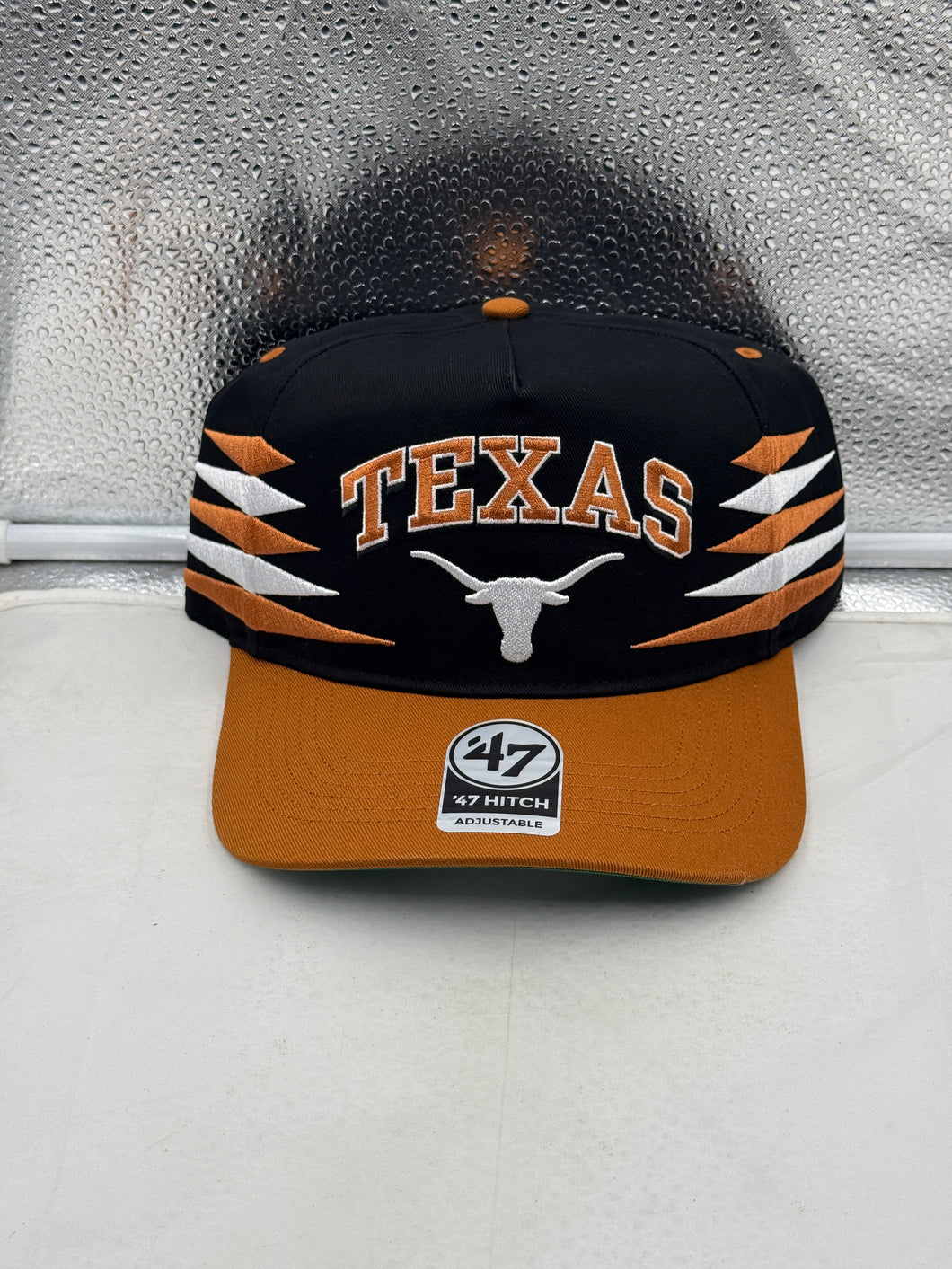 Texas Longhorns NCAA '47 Brand Black Diamond Hitch Snapback Adjustable Hat showcasing its stylish design and adjustable snapback feature.