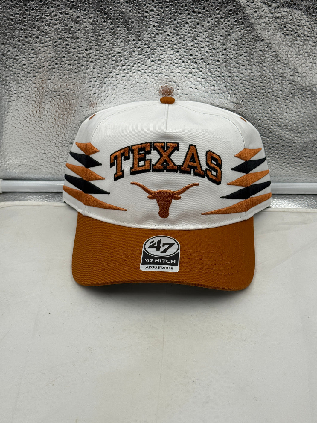 Texas Longhorns NCAA '47 Brand White Diamond Hitch Snapback Adjustable Hat featuring the iconic Longhorns logo and stylish white diamond pattern.