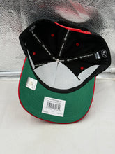 Load image into Gallery viewer, Group of friends wearing the Atlanta Falcons hat during tailgating, showcasing its relevance for game days and social events.
