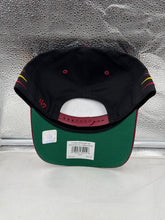 Load image into Gallery viewer, Fan wearing the Washington Commanders NFL &#39;47 Brand Black Diamond Hitch Snapback Adjustable Hat at a game, demonstrating style and team spirit.
