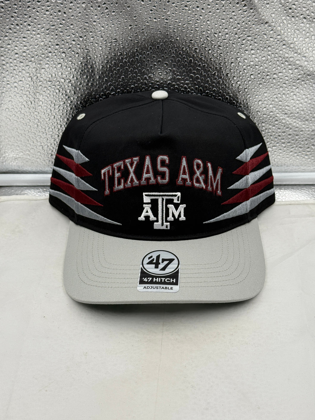 Texas A&M Aggies NCAA '47 Brand Black Diamond Hitch Snapback Adjustable Hat showcasing a sleek black design with the iconic Texas A&M logo.