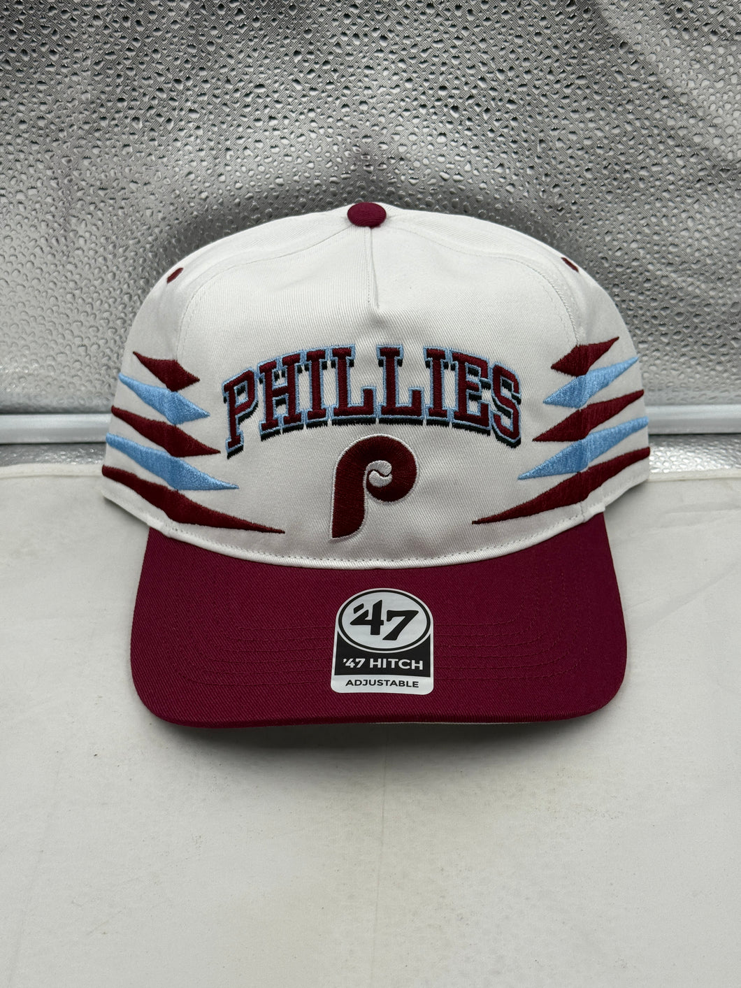 Philadelphia Phillies MLB '47 Brand White Diamond Hitch Adjustable Snapback Hat displayed on a mannequin showcasing its classic design and white color.