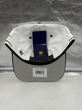 Load image into Gallery viewer, Side angle of the Notre Dame Fighting Irish NCAA &#39;47 White Diamond Hitch Snapback Adjustable Hat, highlighting the stylish design and breathable material for sunny game days.
