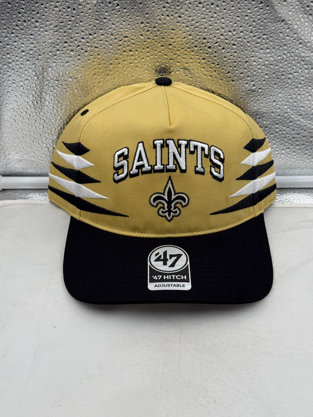 New Orleans Saints NFL '47 Brand Gold TT Diamond Hitch Snapback Adjustable Hat displayed on a mannequin, showcasing its stylish design and iconic team logo.