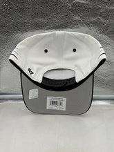 Load image into Gallery viewer, Las Vegas Raiders NFL &#39;47 Brand White TT Diamond Hitch Snapback Adjustable Hat worn outdoors, perfect for game day or casual outings.
