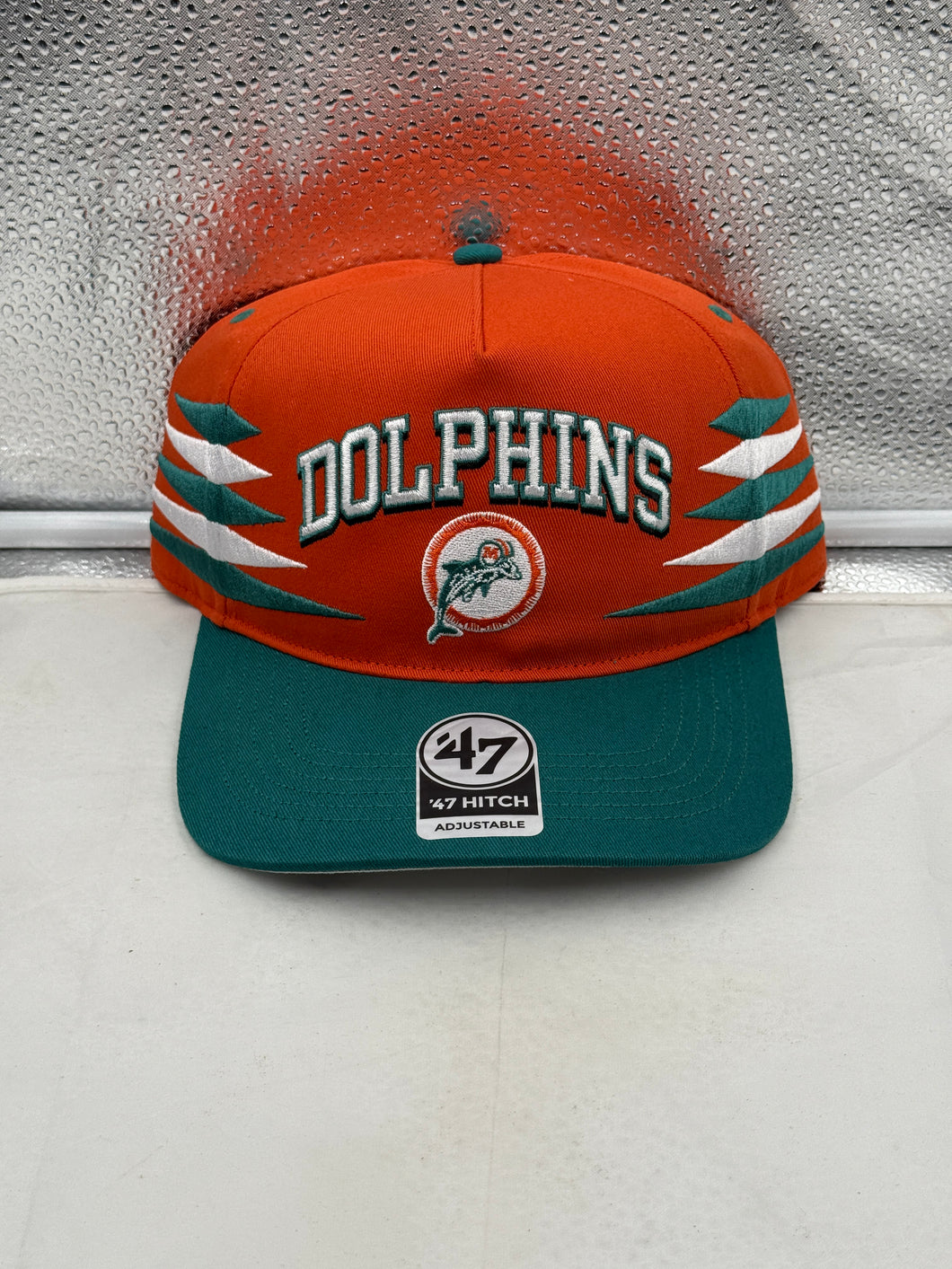 Miami Dolphins NFL '47 Throwback Orange TT Diamond Hitch Snapback Adjustable Hat showcasing vibrant orange color and iconic team logo for fans.