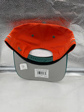 Load image into Gallery viewer, Miami Dolphins NFL &#39;47 Throwback Orange TT Diamond Hitch Snapback Adjustable Hat worn at a game, illustrating team spirit and style.
