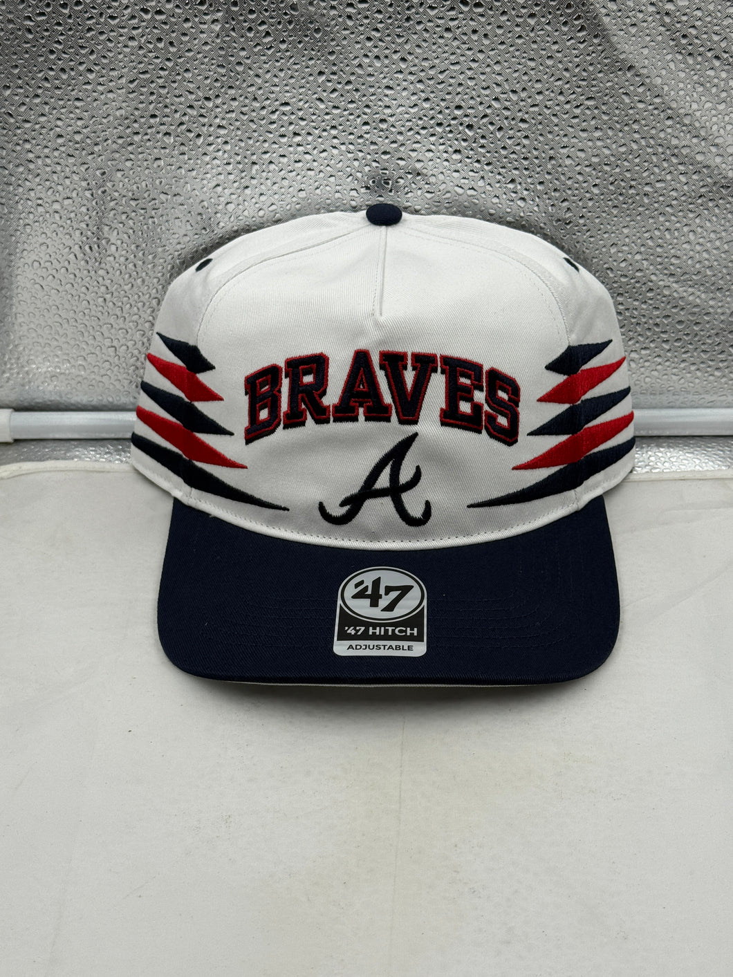 Front view of the Atlanta Braves MLB '47 Brand White TT Diamond Hitch Adjustable Snapback Hat showcasing its vibrant design and team logo, ideal for any Atlanta Braves hat fan.