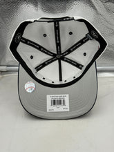 Load image into Gallery viewer, Lifestyle image of a person wearing the Atlanta Braves MLB &#39;47 Brand White TT Diamond Hitch Adjustable Snapback Hat at the ballpark, showcasing team pride and the versatile style of this Atlanta Braves hat.
